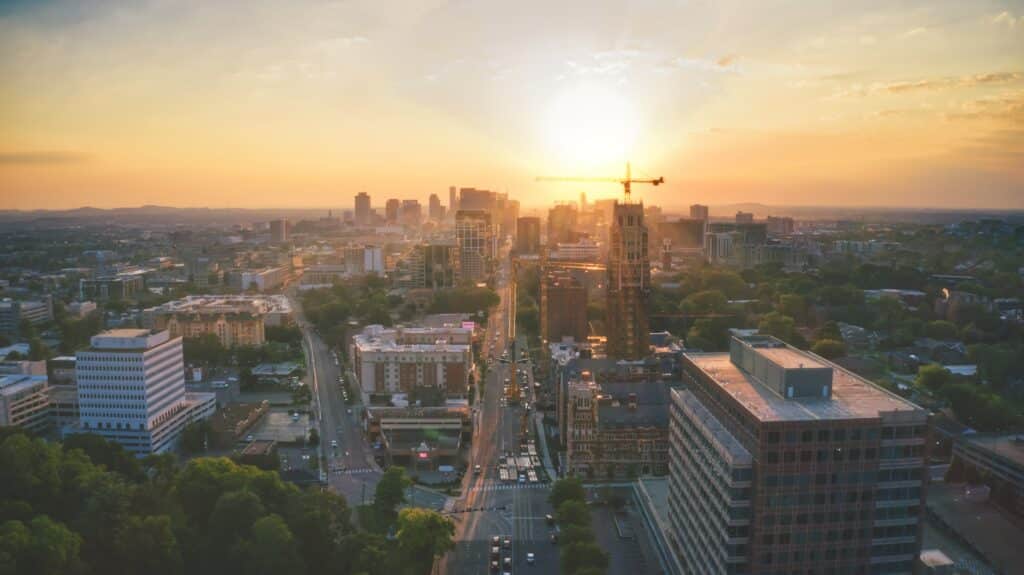 tower crane in the distance at sunset