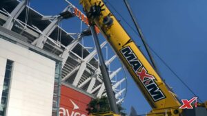 Maxim Crane outside of Paycore Stadium during rebranding project