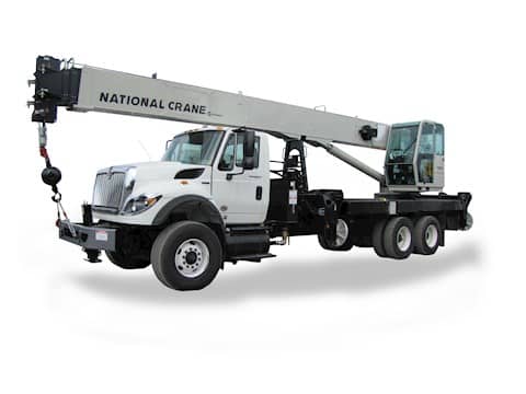 National Crane truck with extended boom for heavy lifting tasks and construction projects.