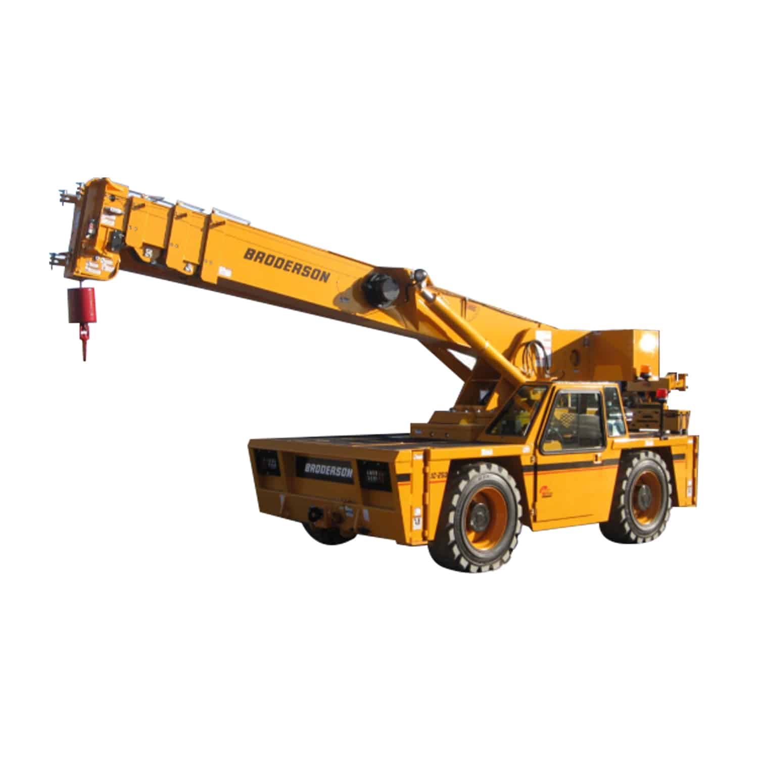 Broderson crane vehicle with extended boom for versatile lifting and construction applications.
