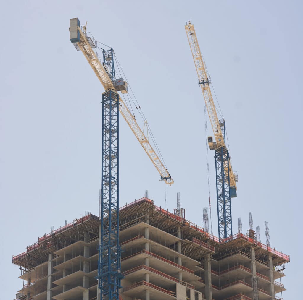 tower cranes in office building construction