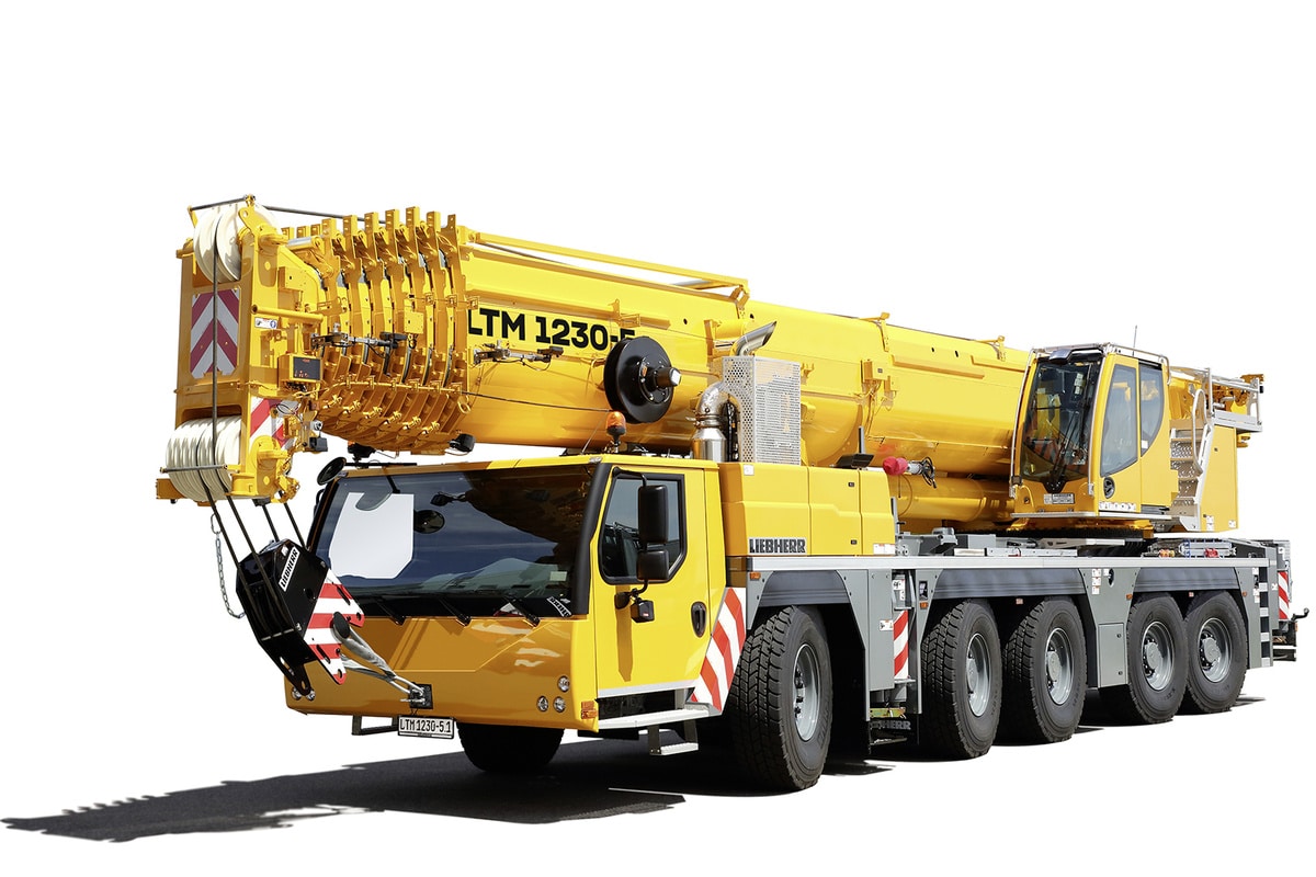 Liebherr LTM 1230 crane with extended boom ready for heavy lifting tasks.