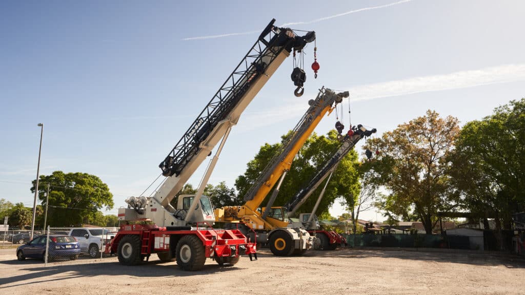 Cranes in the yard, ready for construction and heavy lifting tasks.