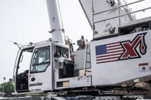 Maxim crane AC 7450-1 features a spacious operator cabin and advanced machinery design.
