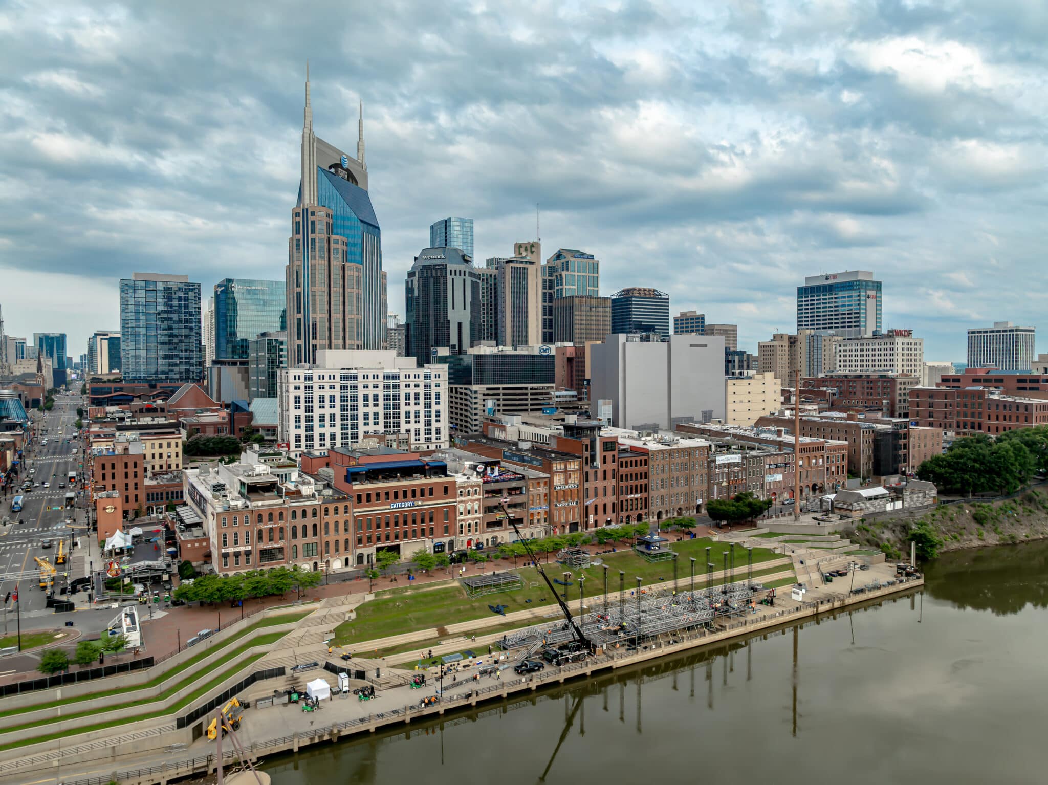 Nashville skyline during CMA Fest 2025 featuring historic buildings and modern architecture along the river.