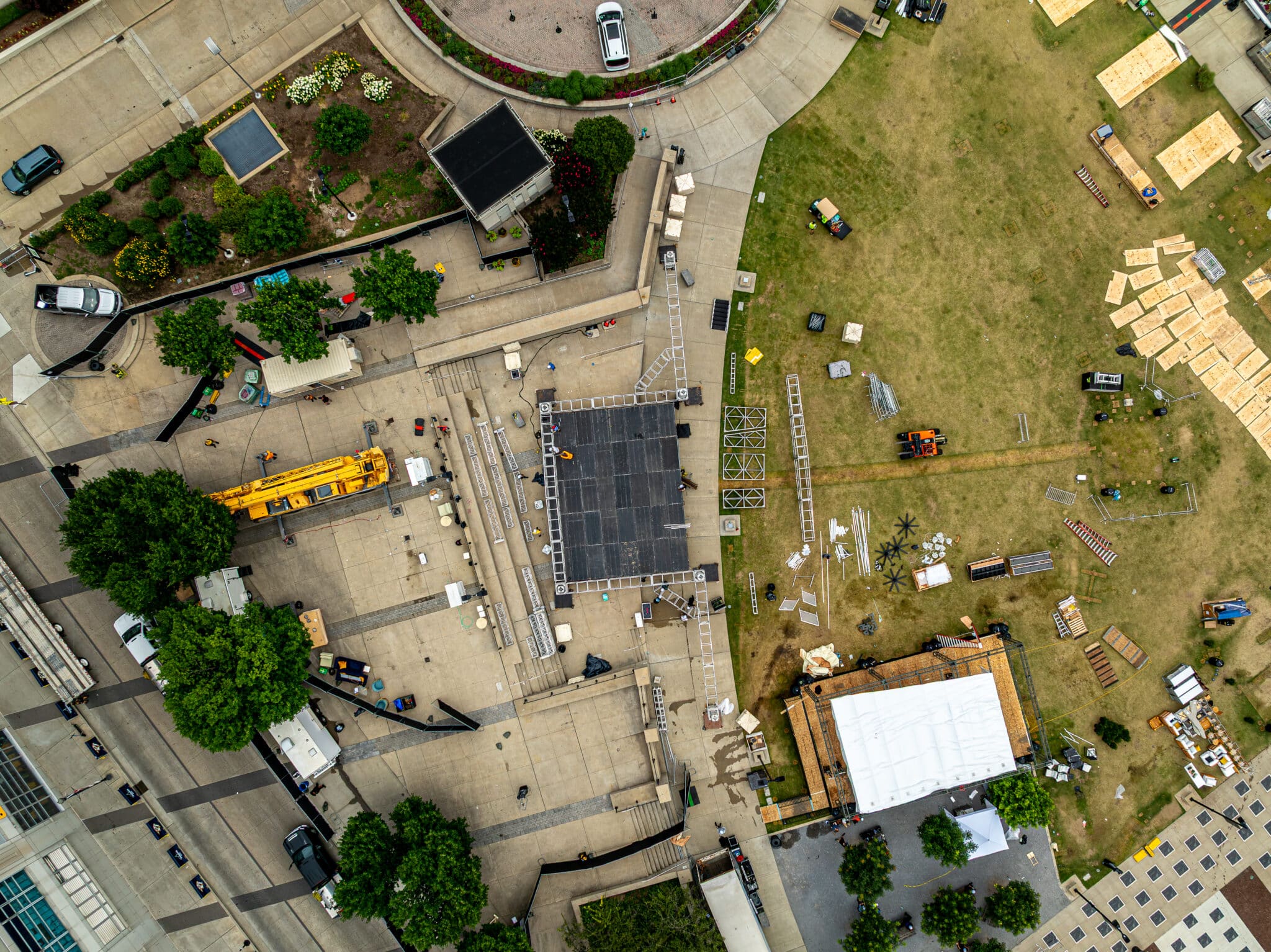 Aerial view of stage setup featuring equipment and preparation for an event.